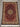 Full view of silk Persian rug placed on floor – traditional design
