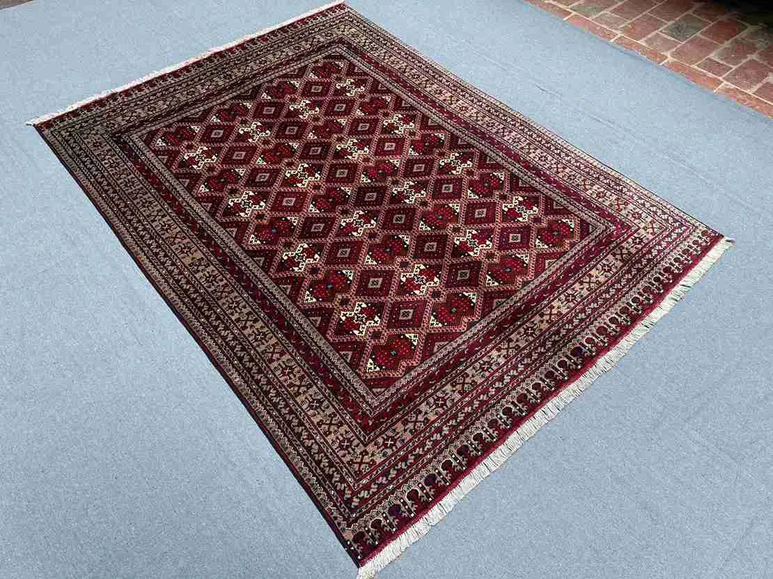 Traditional Turkish handmade rug laid out on modern floor