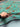 Detail in Hand of 6x10 ft Turquoise Tree of Life Rug – Knotted Persian Wool Carpet
