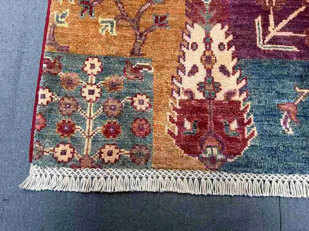 Corner detail of tribal geometric pattern in patchwork kilim carpet