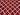 Detailed pattern from corner of boho tribal kilim rug – red wool