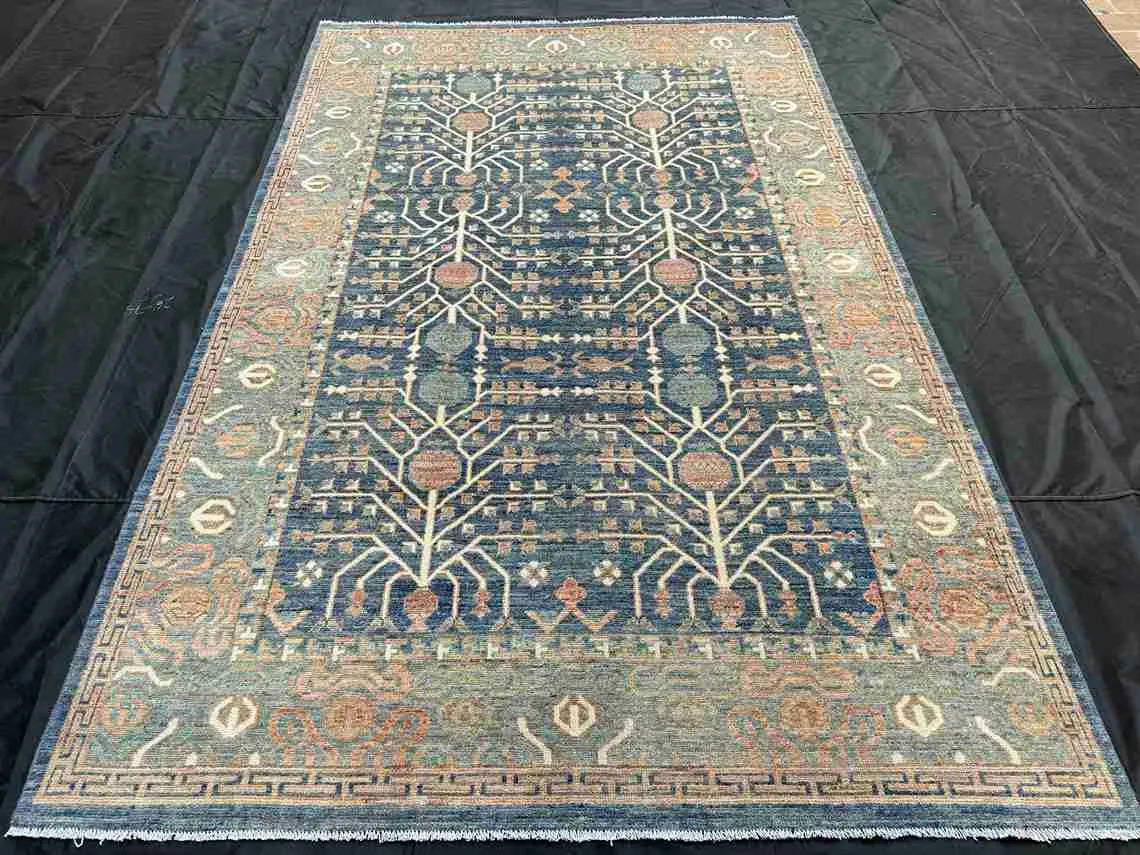 Blue and beige Turkish wool rug styled for home interior décor