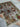 Side fold of 6x9 handmade Waziri tribal wool carpet