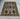 Waziri 6x9 ft rug styled on hardwood floor in living space
