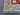 Floral corner design of handmade red and blue Ziegler Persian rug