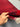 Handmade red 3x12 runner rug held in hand – front texture and weave detail