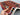 Small 3x4 handmade Pazyryk wool rug held in hands