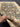 Handmade 5x6 wool carpet shown in hands – green oriental floral design
