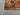 Corner detail of 5x7 tribal wool carpet – vibrant bohemian design