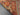 Folded backside of knotted tribal rug – wool and silk texture detail