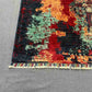 Corner fold showing backside and knot density of handmade 5x7 rug
