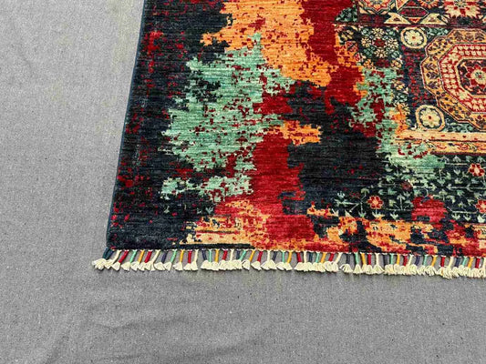 Corner fold showing backside and knot density of handmade 5x7 rug