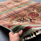  Handmade 5x7 Tribal Wool Rug in hands – front view of red Khorjin carpet