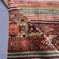 Folded front view of 5x7 handmade tribal Khorjin wool rug