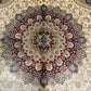 Detailed view of floral pattern on handmade silk oriental rug