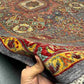 6x8 handmade Turkish Mamluk rug shown in hands – wool silk knotted oriental design