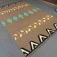 Side-angle view of 6x9 Kilim rug on floor highlighting texture.