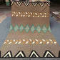 Top view of full 6x9 Kilim rug laid flat showing entire geometric design.