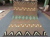 Top view of full 6x9 Kilim rug laid flat showing entire geometric design.
