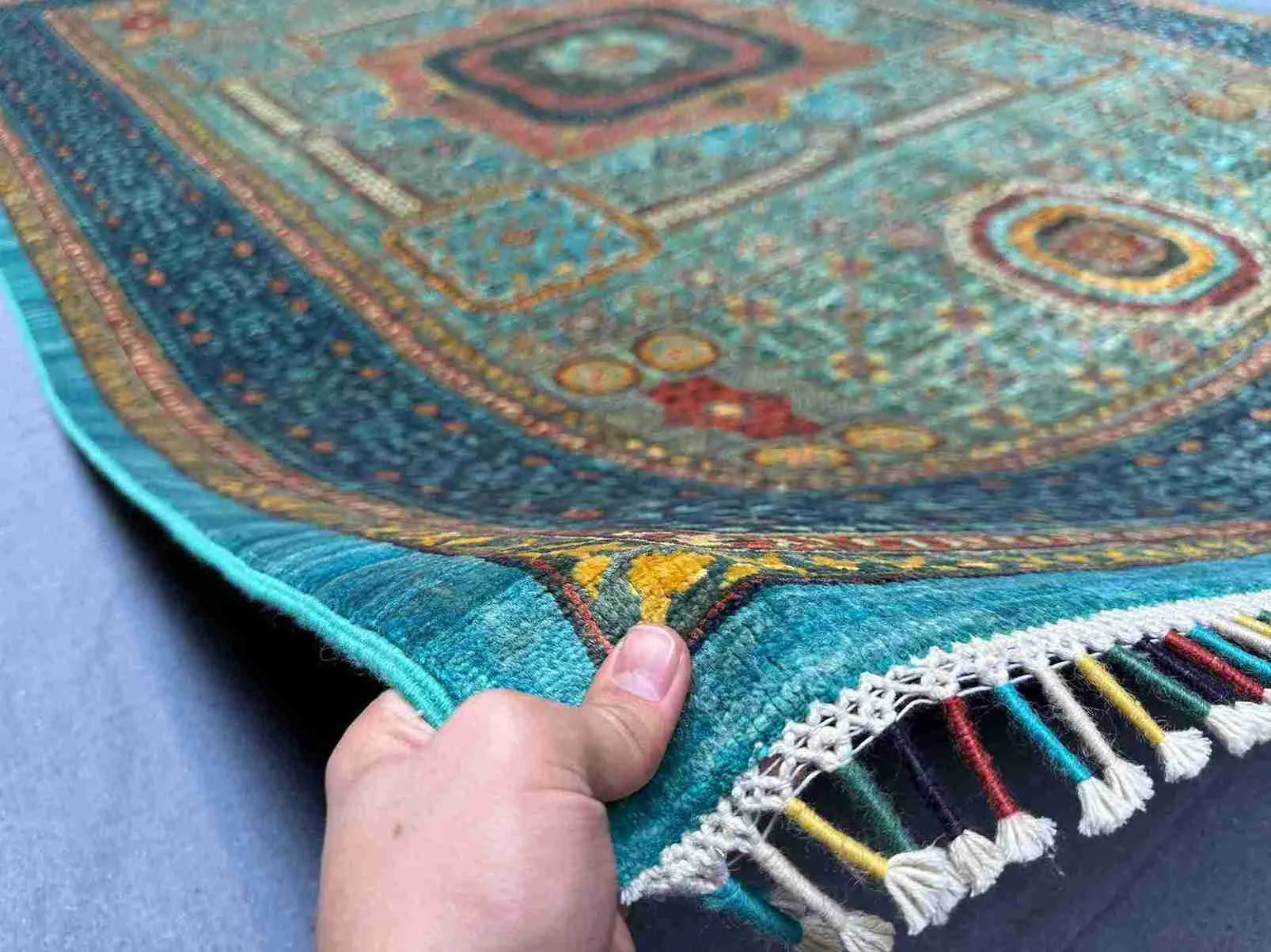 6x9 handmade vintage-inspired Mamluk rug shown in hands – wool and silk Oriental carpet