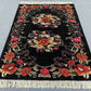Traditional 8 ft Oriental Karabakh rug displayed on wooden floor