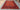 8x12 handwoven Kilim rug with geometric red and black pattern – Turkish tribal carpet on floor.