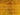 Zoomed-in view of faded vintage pattern on orange Persian rug