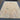 Knotted hand-made wool rug with traditional design on floor