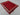 Small vintage Afghan Kilim rug displayed on floor – red wool flatweave for rustic or boho decor.