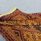 Folded view of Afghan kilim rug showing vintage handwoven craftsmanship