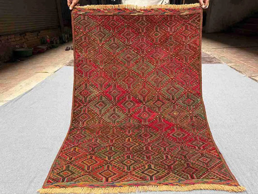 Full top-down view of 3.5x4.9 red Afghan kilim tribal wool rug