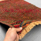 Handmade Afghan red kilim rug 3.5x4.9 ft shown in hands – tribal wool carpet