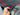 Handmade Afghan Turkish rug 6.8x10.3 ft shown in hands – green and red wool-silk carpet