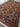  Full room view of Afghan handmade rug styled in a modern home.