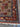 Corner detail of luxury Afghan knotted wool rug showing intricate weaving.