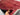 In-hands view of 7x10 traditional handmade Oriental wool rug