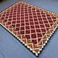 Vintage red kilim wool rug in boho living room – handmade area carpet