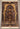 Full top view of handmade Persian silk rug with floral and bird design