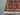 Corner view of authentic hand-knotted Waziri Oriental rug