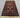 Full layout of authentic Baluch wool rug on wood floor