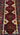  Close-up of Baluch rug floral design – red and beige Afghan pattern