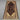 3x4 handmade Baluchi tribal rug styled on the floor of a small rustic room