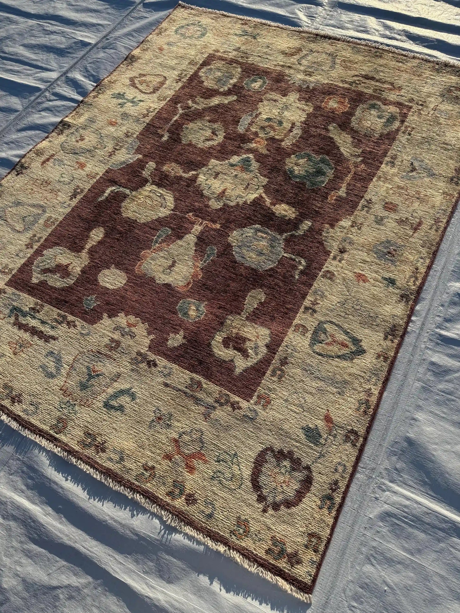 Wool Oushak rug on floor in rustic style room – tribal oriental patterns