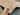 Handmade Beige Gabbeh Rug held to show soft wool texture
