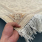 In-hand view of 8x9.11 ft handmade beige & taupe Ziegler wool rug
