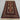 Full view of handmade black and beige wool rug on wooden floor