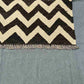Corner edge of Kilim rug showing precise hand-knotted finish