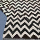 Folded Kilim rug showing flexible flatweave texture