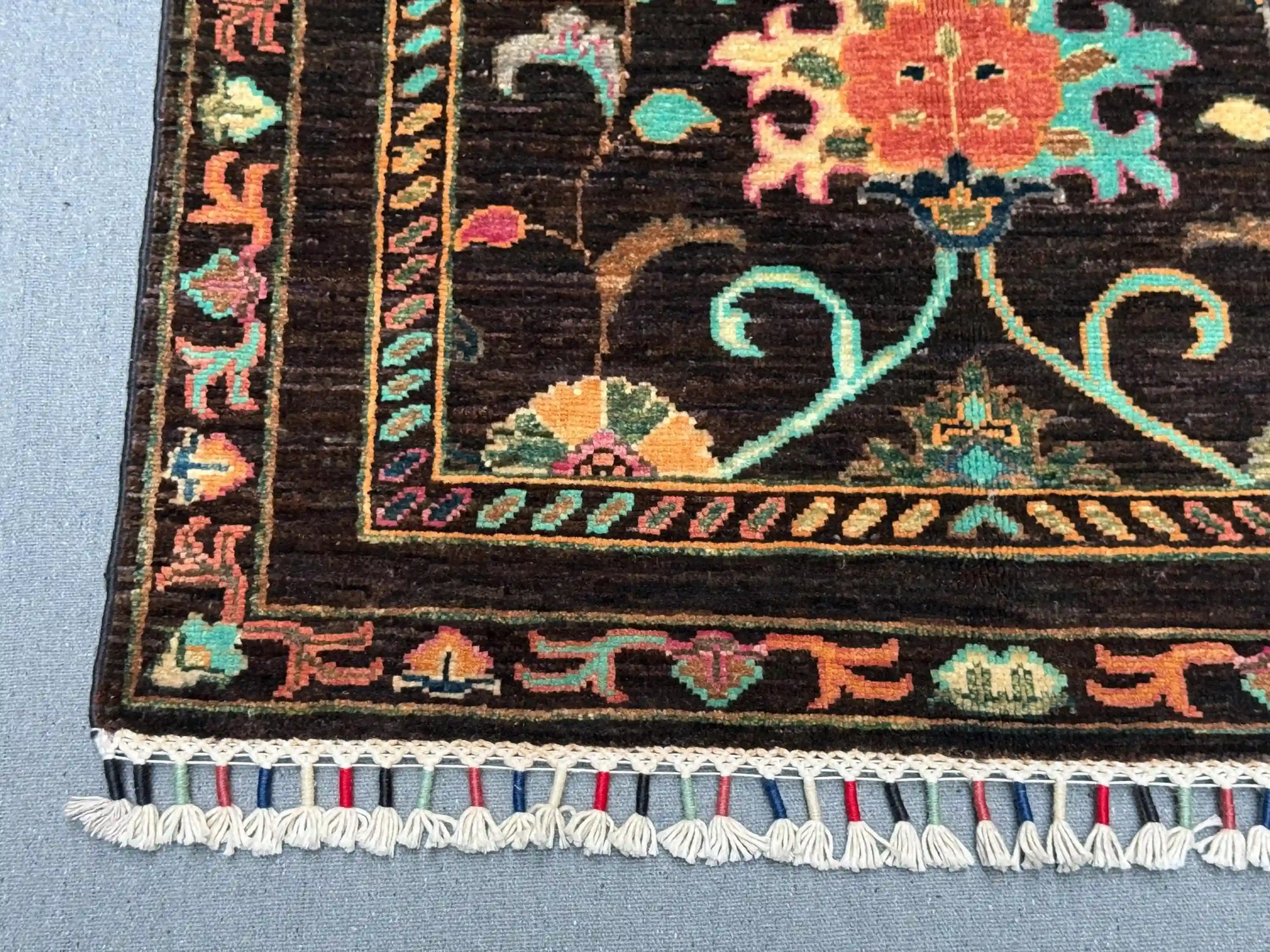 Corner detail of Black Sultani handmade wool hallway rug