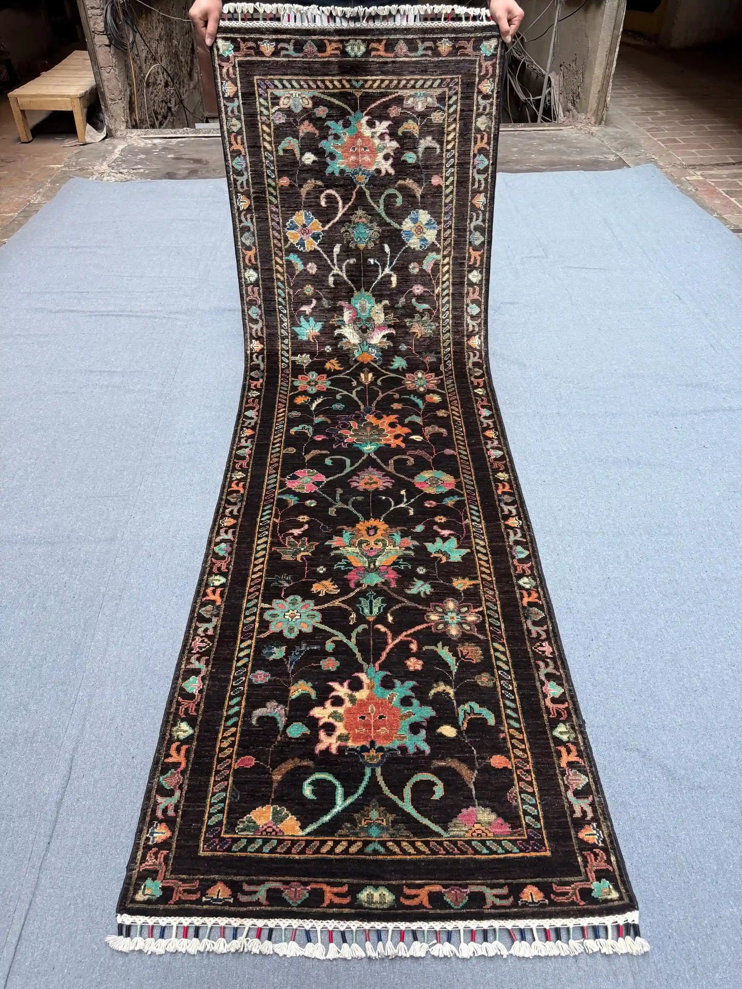 Full top-down view of Black Sultani 2.6x8.2 ft handmade wool runner rug
